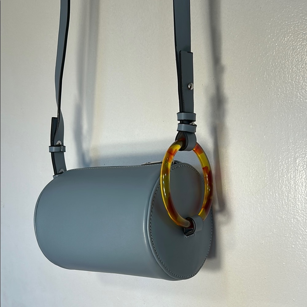 Elegant Blue Cylinder Bag with Tortoise Accents